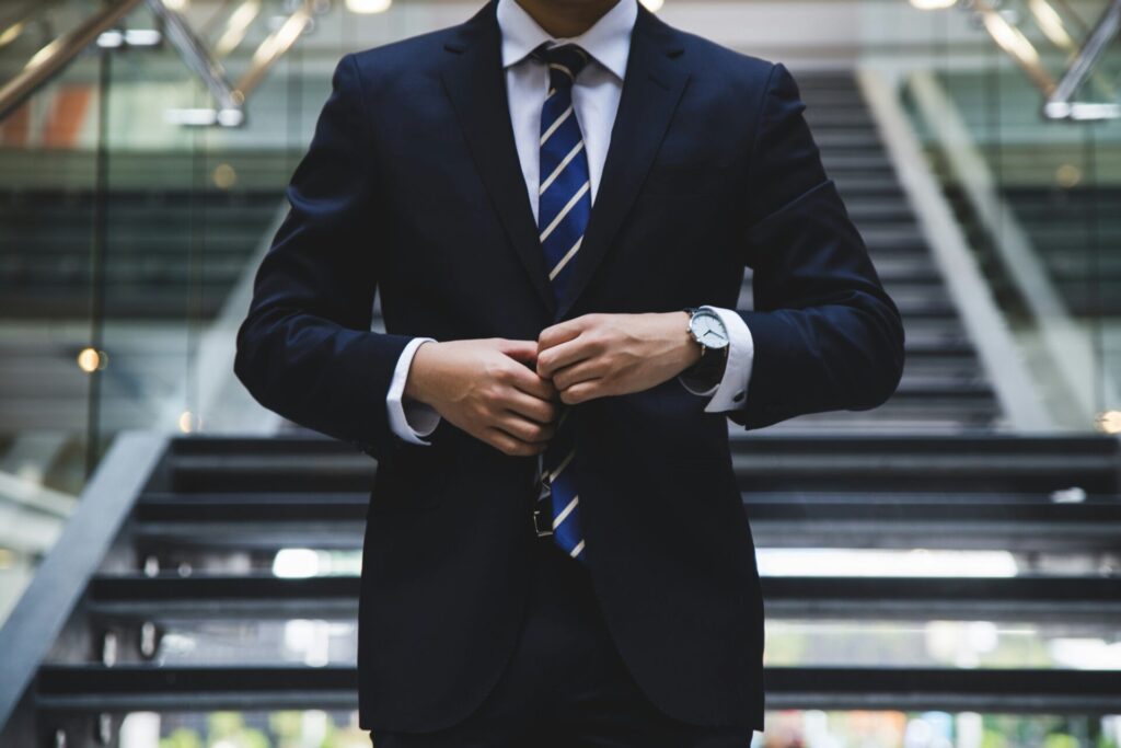 A man in a suit to implicate a seishain working in a suit